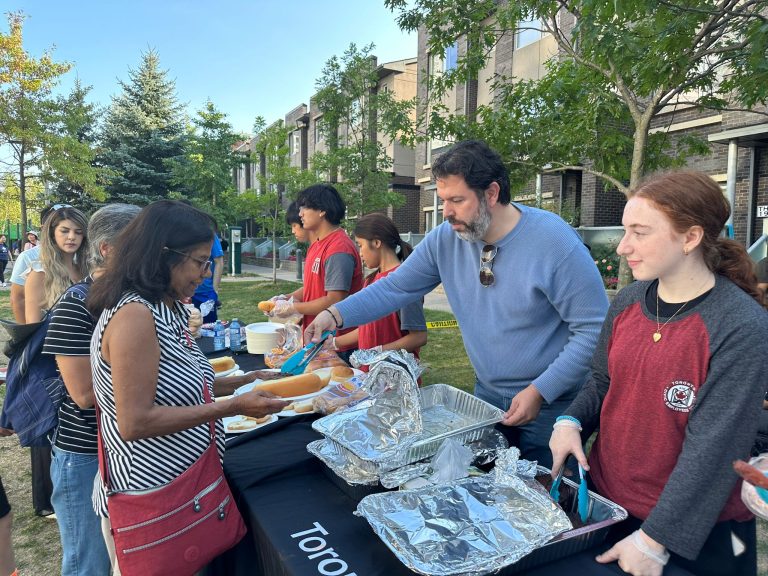 Family Movie Night Nick serving BBQ Village. Green